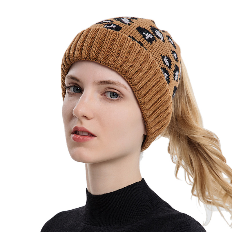 European and American new leopard print knitted hat winter women's ponytail foreign trade autumn and winter warm large brim wool hat