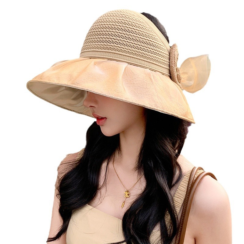 New summer style wide-brimmed visor hat for women, sun protection, versatile, bow-tie sun hat, foldable, suitable for outdoor use.